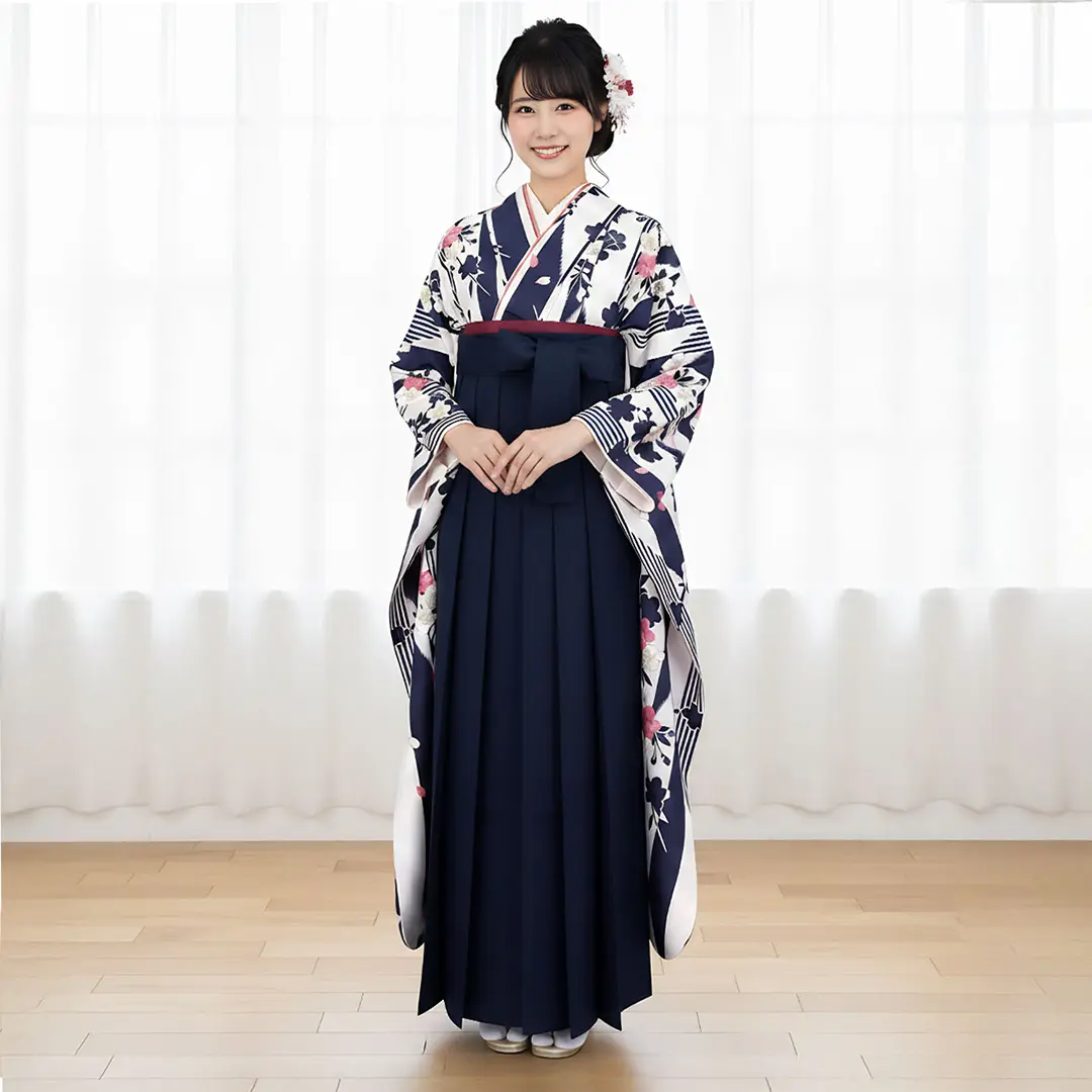 白地に紺の矢絣と枝垂れ桜の振袖・紺袴（無地） （振袖）／卒業式