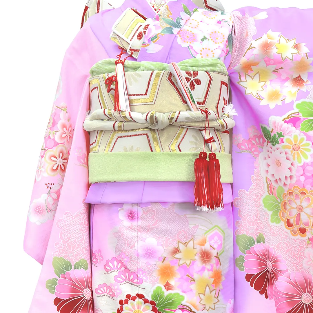 ピンクと紫地に花丸文の着物（アイボリー帯にグリーン）／七五三・七歳