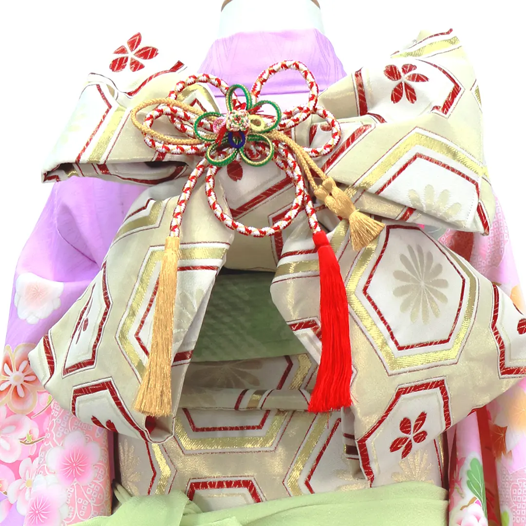 ピンクと紫地に花丸文の着物（アイボリー帯にグリーン）／七五三・七歳