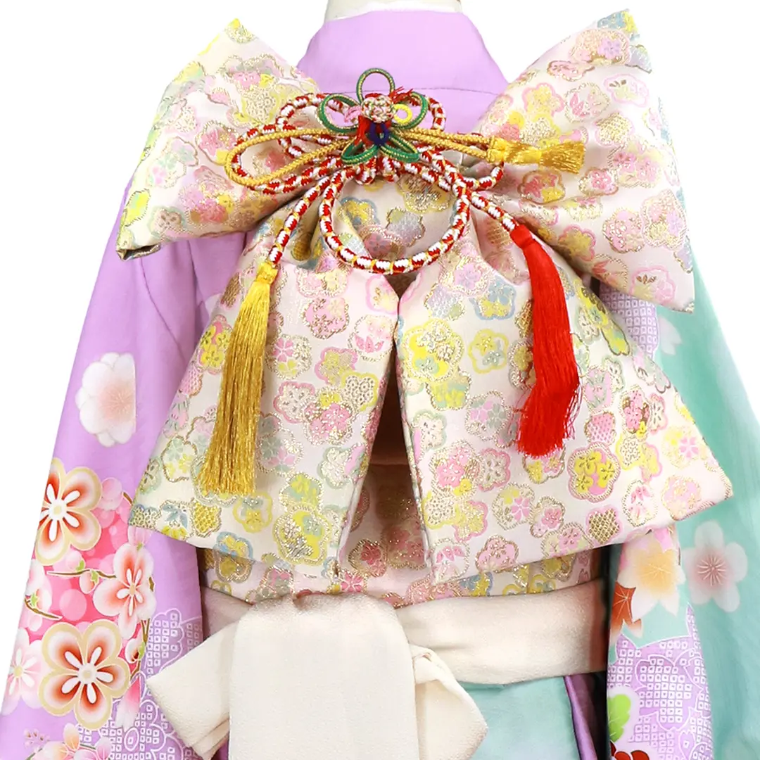 青緑とピンク地に花丸文の着物（白帯にアイボリー）／七五三・七