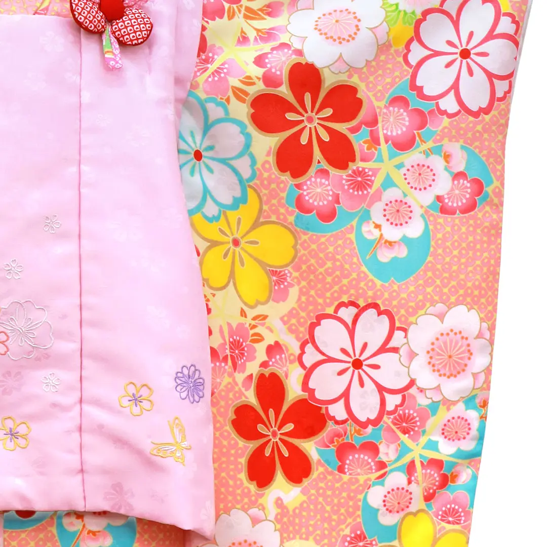 ピンクの鹿の子に桜尽くしの着物、桃色の被布コートセット／七五三・三