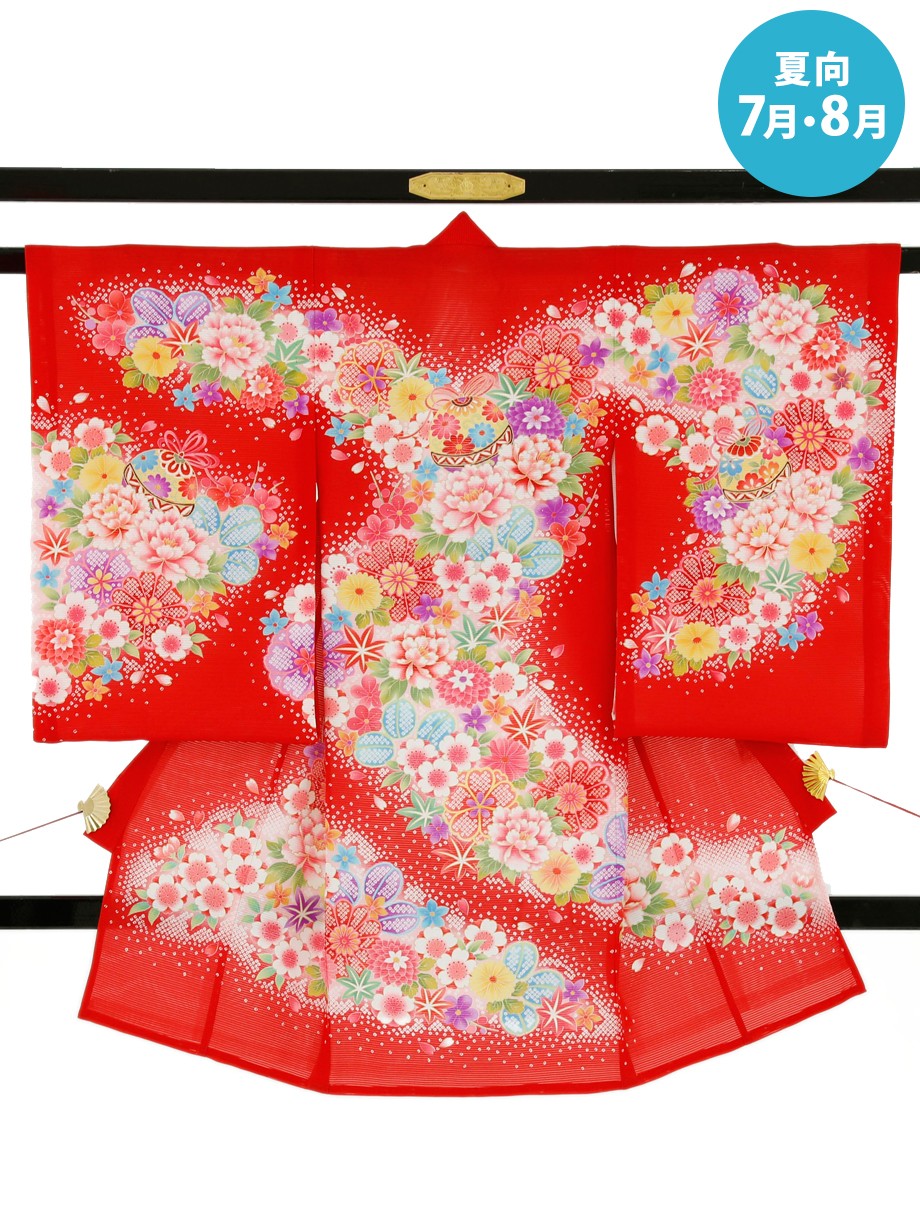 赤地に鹿の子風柄と鈴の絽の祝い着（産着）
