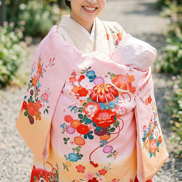 お宮参り産着／ピンクにオレンジと赤の熨斗目の祝い着／女児