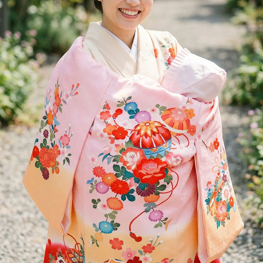 お宮参り産着／ピンクにオレンジと赤の熨斗目の祝い着／女児