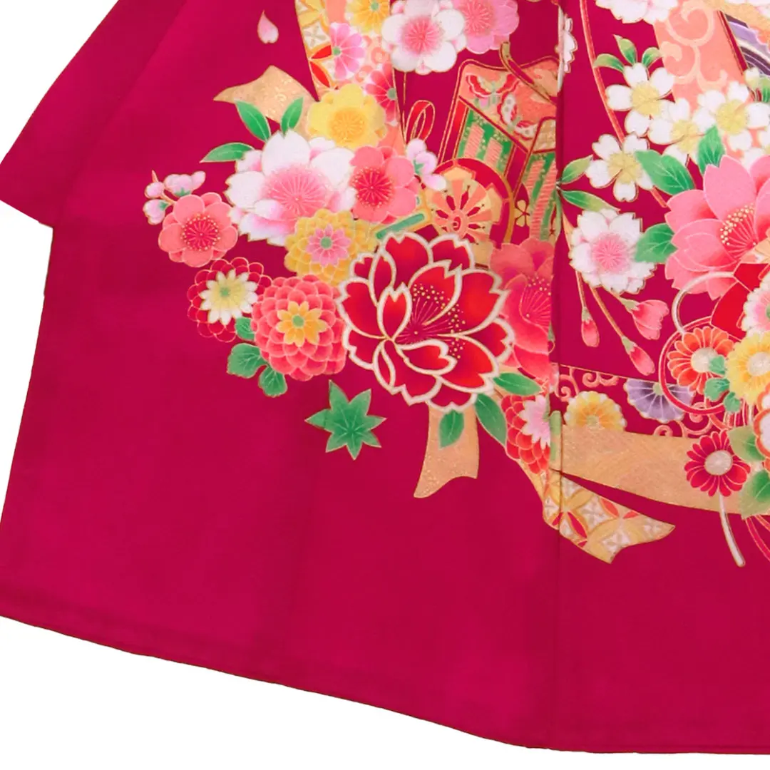 お宮参り産着／ルビー色に熨斗と鈴の祝い着／女児／左裾詳細