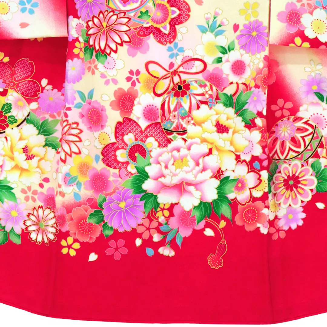 <翔月> 赤地に四季花と鈴の祝い着／裾中央詳細