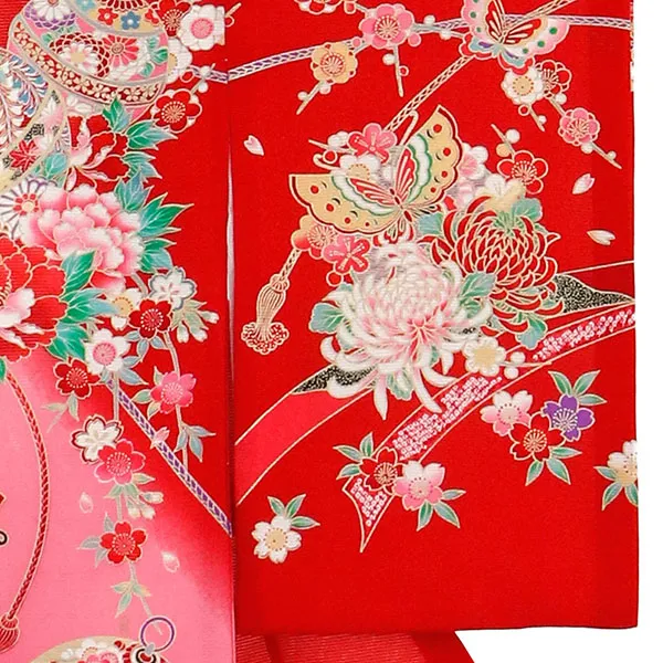赤地に熨斗と蝶（鈴）の絽の祝い着（産着）／女児 右袖