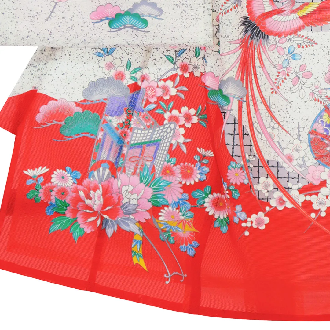 赤地に鼓と鳳凰の絽の祝い着（産着）／女児（ポリエステル）裾模様・左